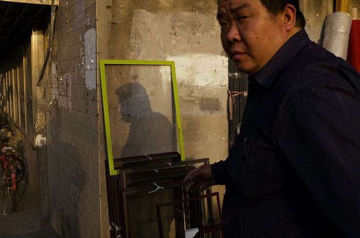 Вуличні фотографії від китайського фотографа Тао Лю (24 фото)